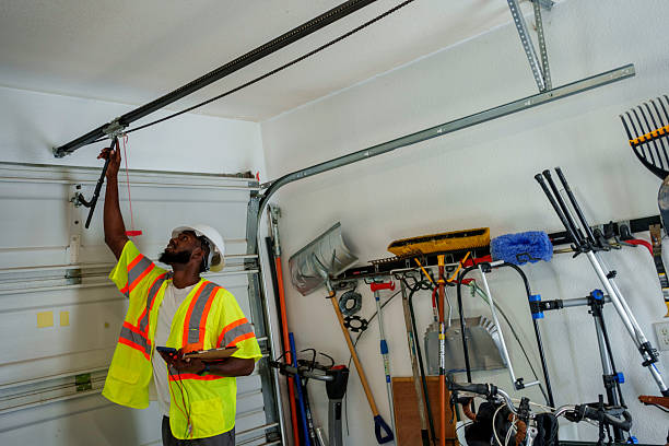 Professional Garage Door Panel Replacement technician working in Garden Home-Whitford, OR